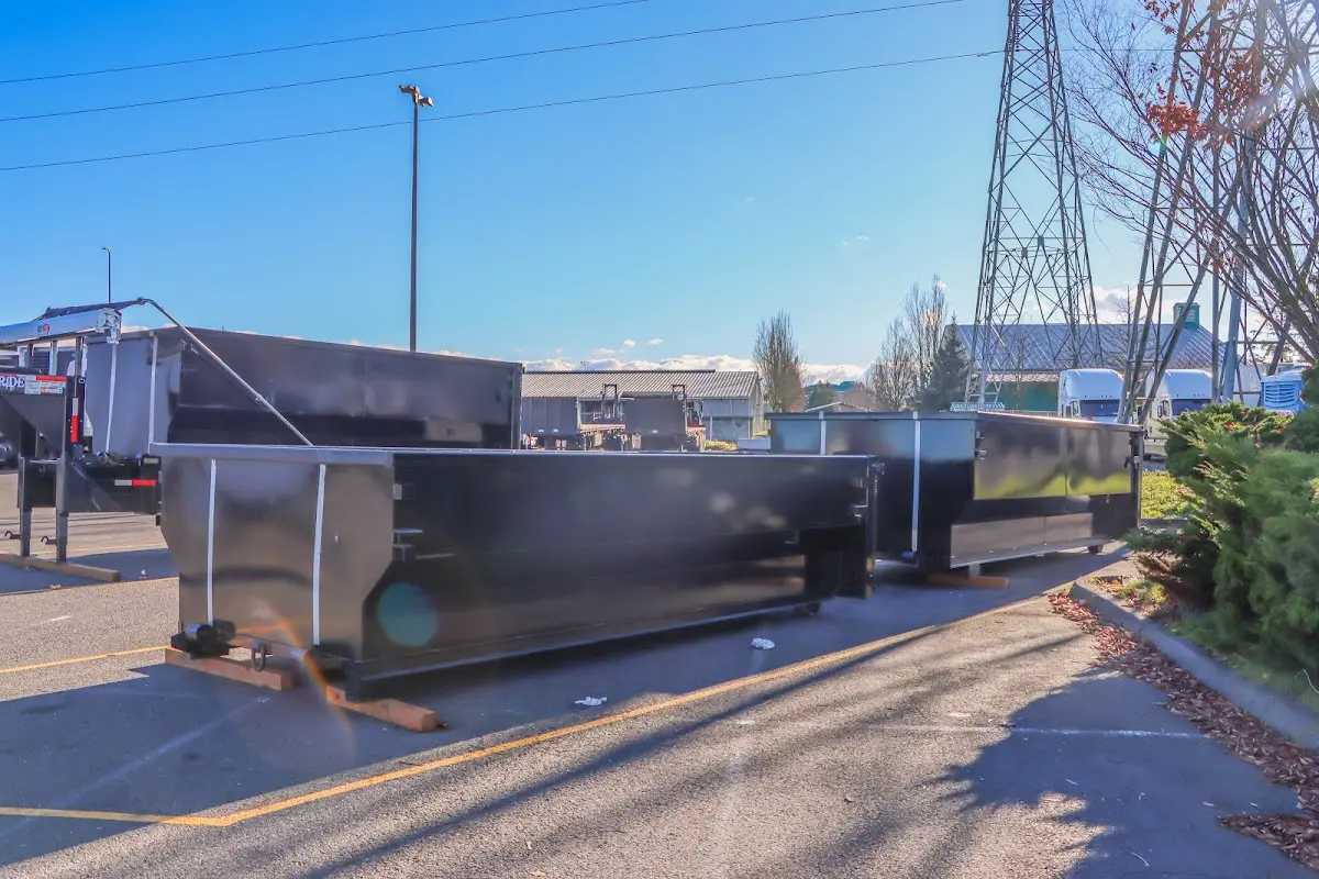 Roll-off dumpster ready for waste disposal at job site for Roofing Dumpster Rental in Uxbridge